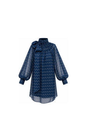 Noor Azhari navy blue polka-dot dress with oversized bow