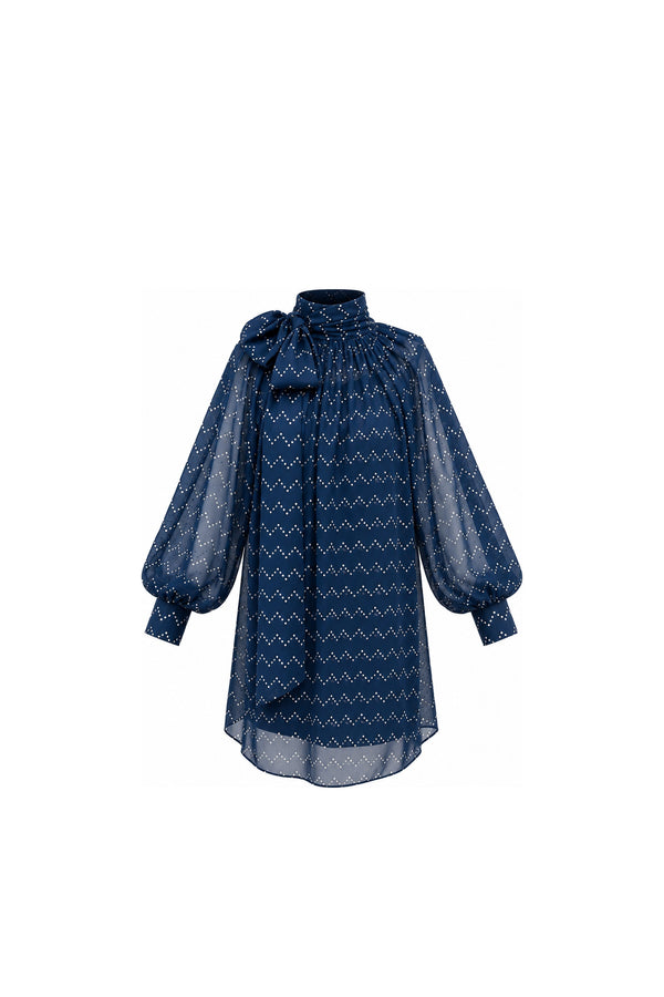 Noor Azhari navy blue polka-dot dress with oversized bow