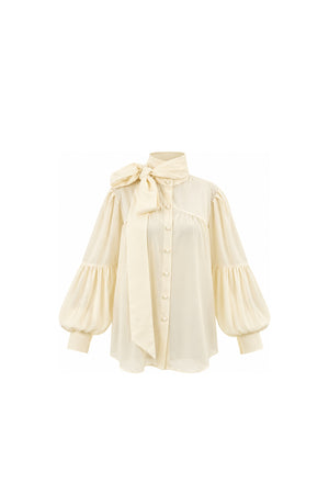 Noor Azhari ivory blouse with oversized bow and balloon sleeves